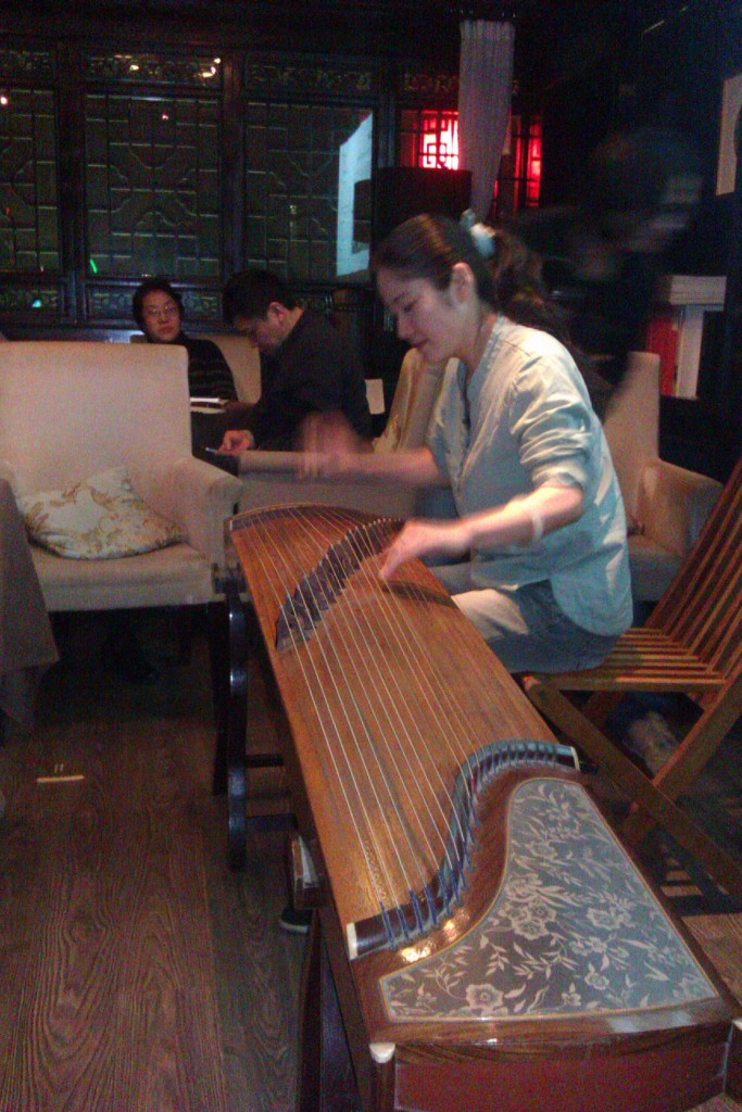Poetry at Shu Yu’s Café, Shu Yu playing the guzheng